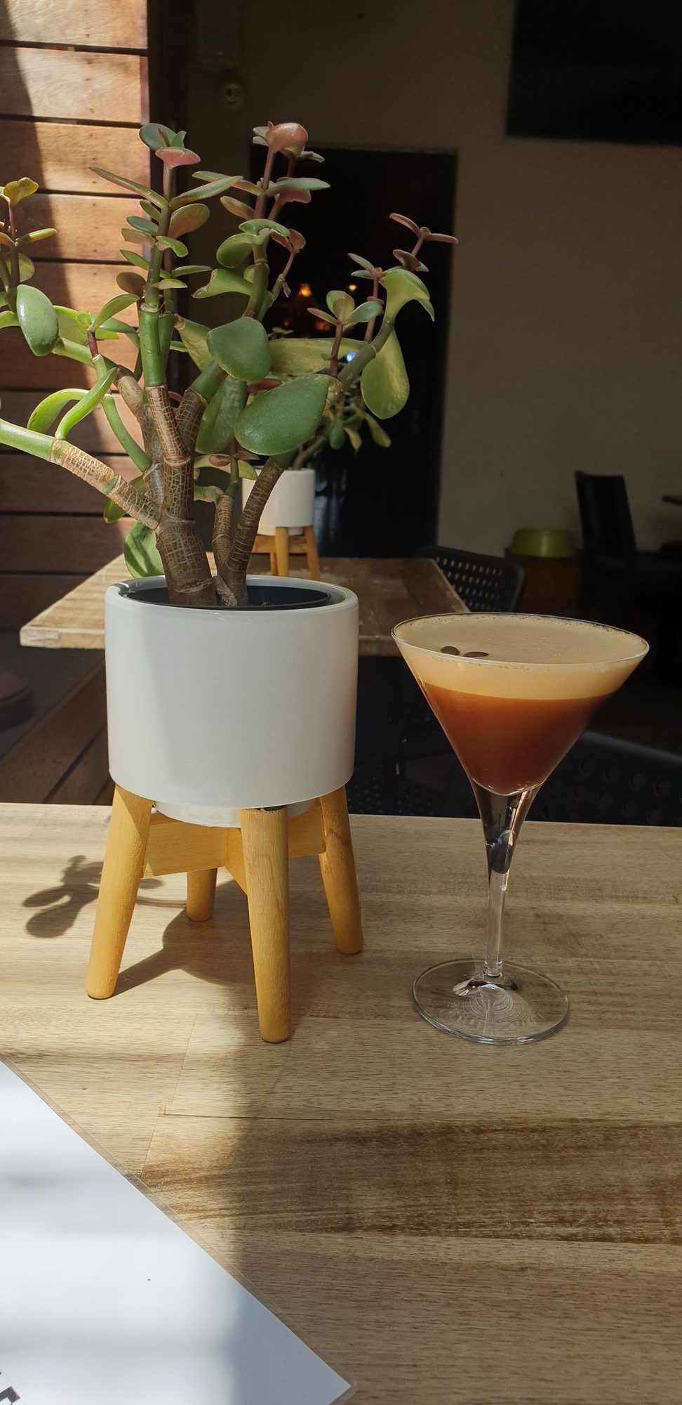 An espresso martini on a timber table at Garf's